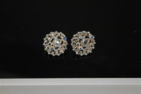 A pair of 20th century Indian style 18k yellow metal and 925 white metal, rose cut diamond and shaped sapphire set foliate earring,